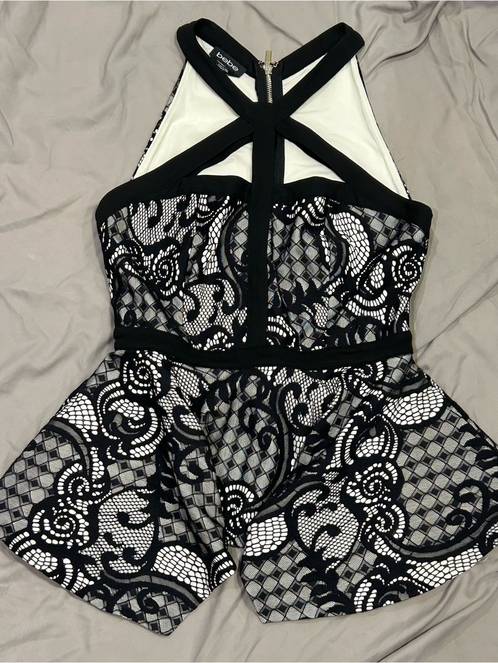 Bebe black and white lace halter top from caged neckline peplum hem sz M